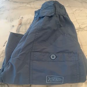 Aftco the original fishing short long.  Size 28.  Grey-blue color.